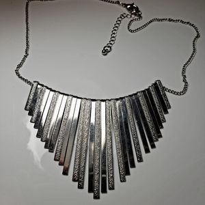 Silver tone accept necklace